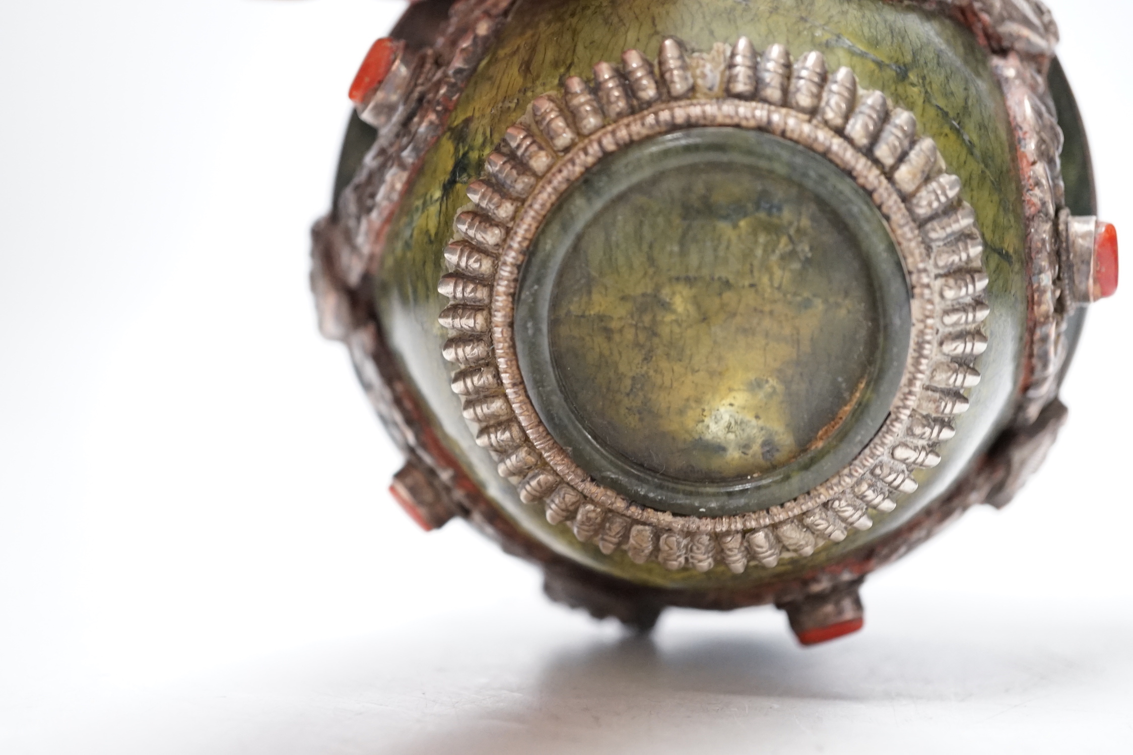 A Tibetan silver cup and a silver mounted hard stone bowl